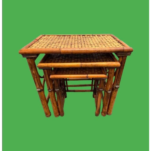 Vintage set of three nesting tables crafted from burnt bamboo and handwoven rattan. Practical and beautiful Circular 1960s...