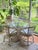 Chairs are on wheels and feature removable cushions. The table comes with a removable tempered glass top 40" in diameter,...