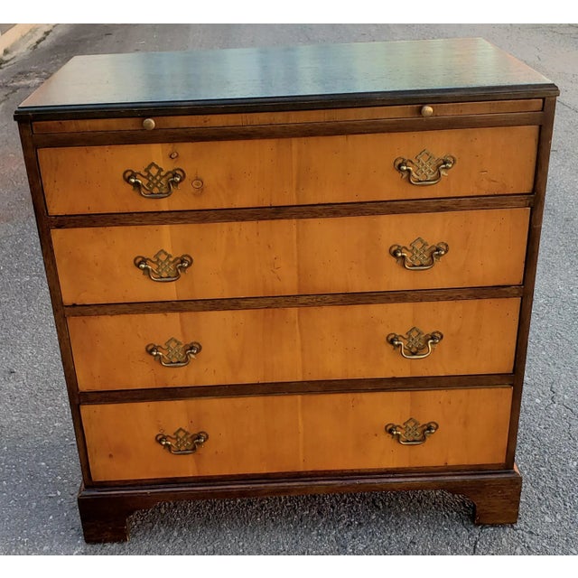 Rare 1940s Vintage Baker Furniture Satinwood and Walnut Chest With Pull Out Tray. Features 4 dovetailed drawers in smooth...