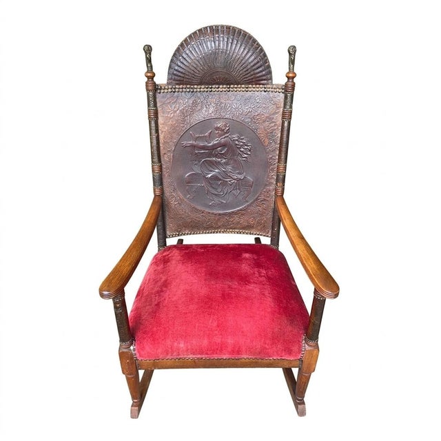 Insanely gorgeous Victorian Aesthetic Movement rocking chair with solid brass satyr finials, original embossed leather...
