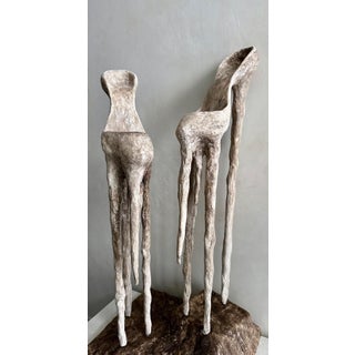 The First Shoes by Cor Oda | Plaster and Steel Sculpture of two abstract shoes For Sale