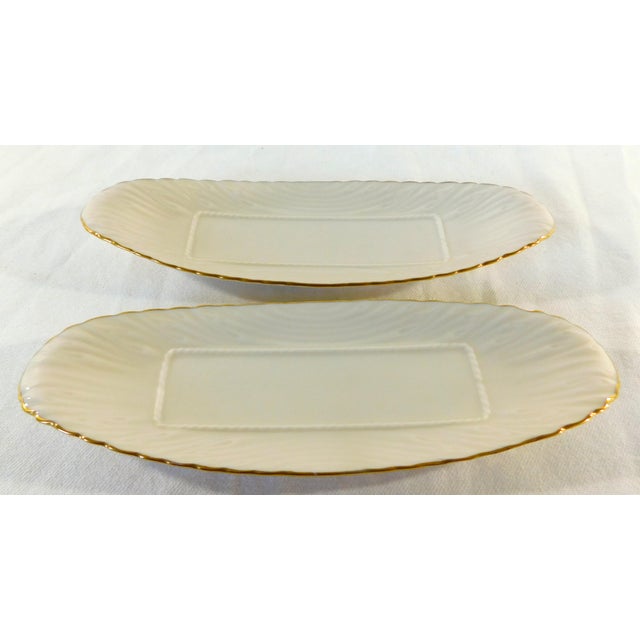 Beautiful set of two Lenox ivory and 24 karat gold trim porcelain embossed butter dishes. Beautiful, embossed design with...
