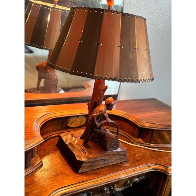 Vintage Paul E. Caron hand carved wooden 24" lamp illustrating traditional rural life in Quebec. This highly collectible...