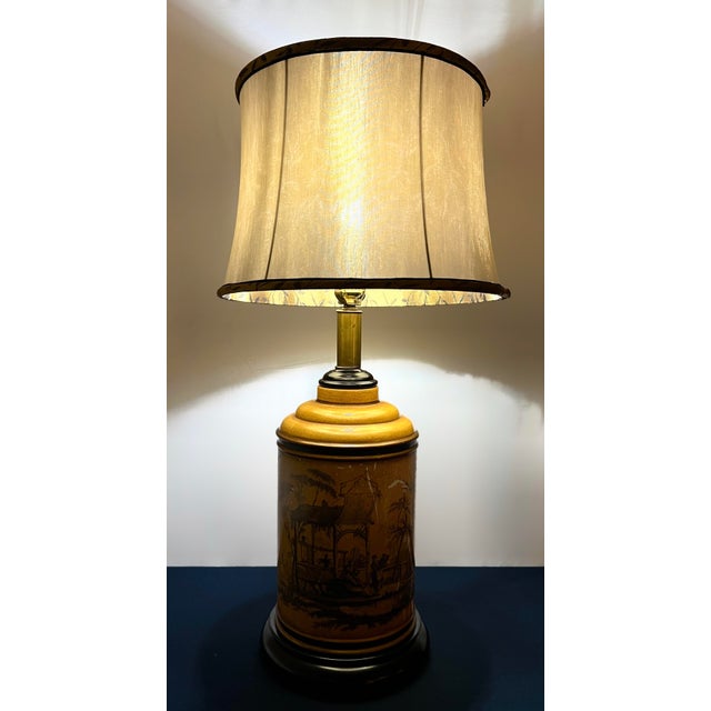 This substantial mid-century modern Hollywood Regency table lamp by Paul Hanson features a heavy, high-density metal...