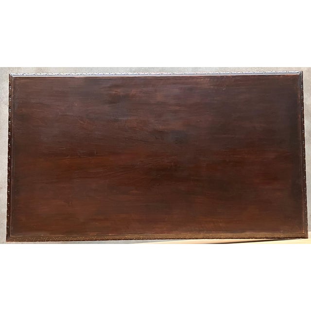 Handsome oak library piece that can be used as a desk or Work table. Made of oak having carved gadrooned edges. A...