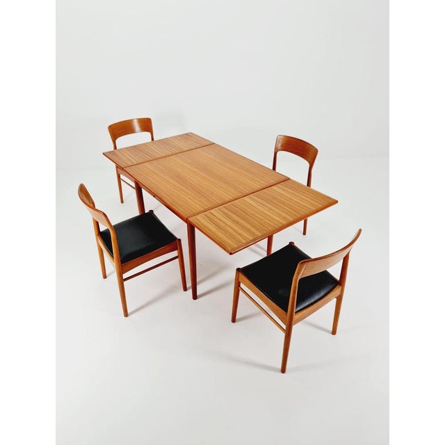 Danish rectangular teak table with two extension leaves, Denmark 1960s The table is in very good condition. Made of teak...