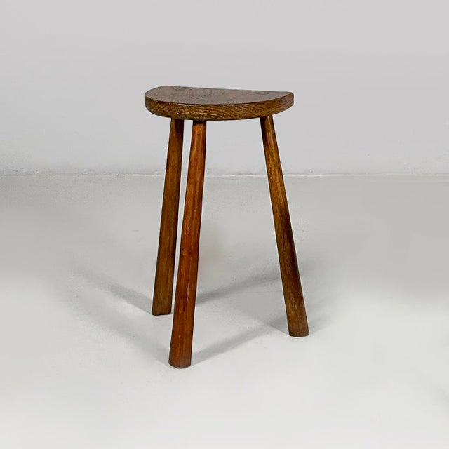 Italian mid-century modern semicircular table stool in wood, 1950s Table stool made entirely of wood. The seat is...