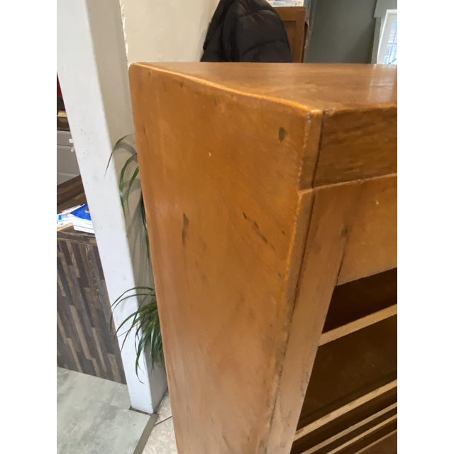 Beautiful vintage cabinet, 1950s roll-top filing cabinet in oak and oak veneer 11 shelves already installed, but more can...