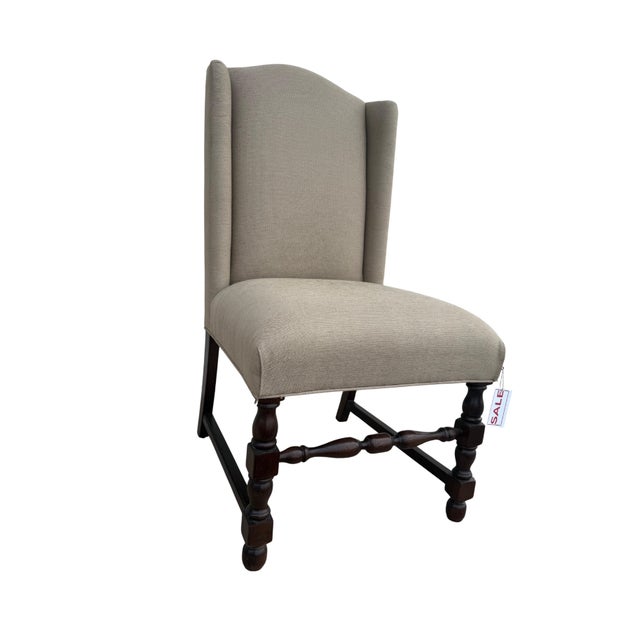 The Belle Maison Side Chair blends timeless elegance with everyday comfort. Upholstered in a soft flax-colored fabric,...