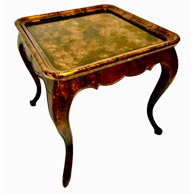 Statement Italian accent table with incredible lines, hand painted in a luminous faux tortoise shell finish. Slender...