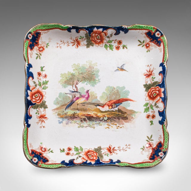 This is an antique display plate. An English, ceramic afternoon tea cake platter, dating to the Edwardian period, circa...