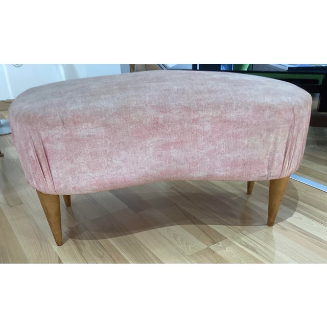 A refined vintage upholstered ottoman dating back to the 1950s, a splendid example of Italian craftsmanship and furniture...