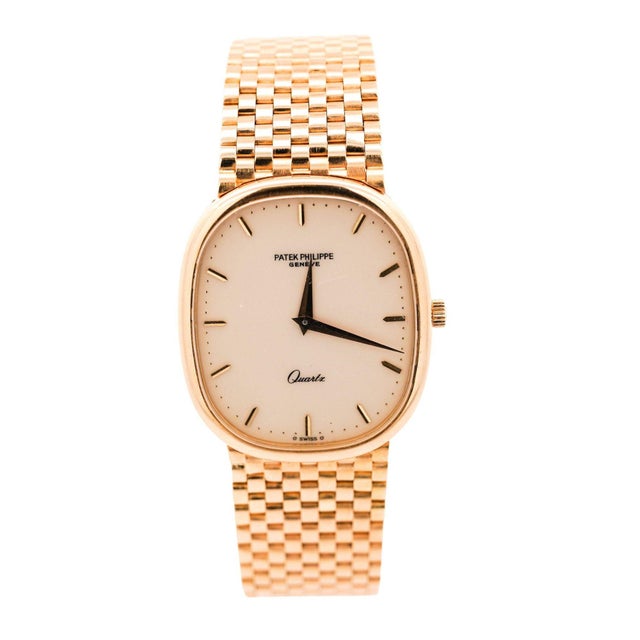 Authentic Pre-Owned Patek Philippe Grand Ellipse 3838 Unisex 18K Yellow Gold Watch. Vintage, circa 1980. Featuring a 31mm...