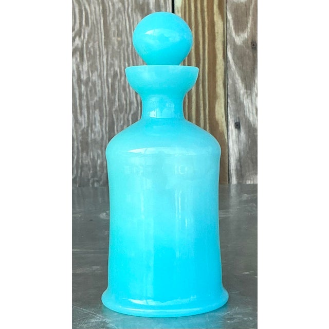 Enhance your decor with this Vintage Boho Opaline Glass Decanter. Featuring a beautifully crafted opaline glass design,...