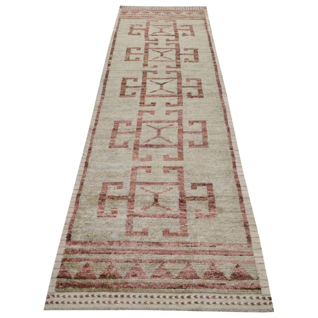 Hand-knotted with care using traditional rug making techniques, this wool rug blends timeless craftsmanship with a modern...