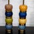 Pair of multicolored stacked ceramic element and brass table lamps