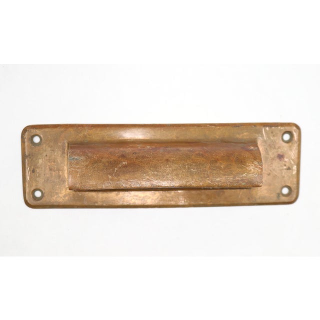 Vintage letter slot made of brass with a patina finish. The original interior plate is not available. The original...