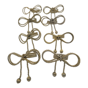 Late 20th Century Hollywood Regency Gold-Tone Metal Rope Bow Napkin Rings - Set of 8