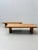 Two exceptional, low-profile coffee tables made of heavy, solid wood, dating from the 1970s. The tabletops consist of...