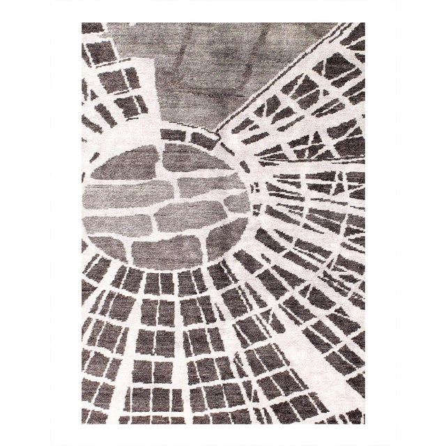 This contemporary rug is from the Modern collection and features a border tan pattern. These rugs bring modern...