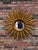 This is a gorgeous gilt wood mirror! Done in layered sunburst style, there are several layers of rays made up of...