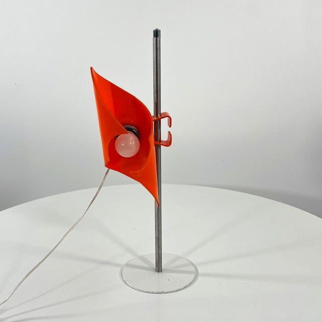 Space Age Adjustable Orange Desk Lamp, 1970s, in Good conditions. Designed 1970 to 1979 European Plug (up to 250V).The...