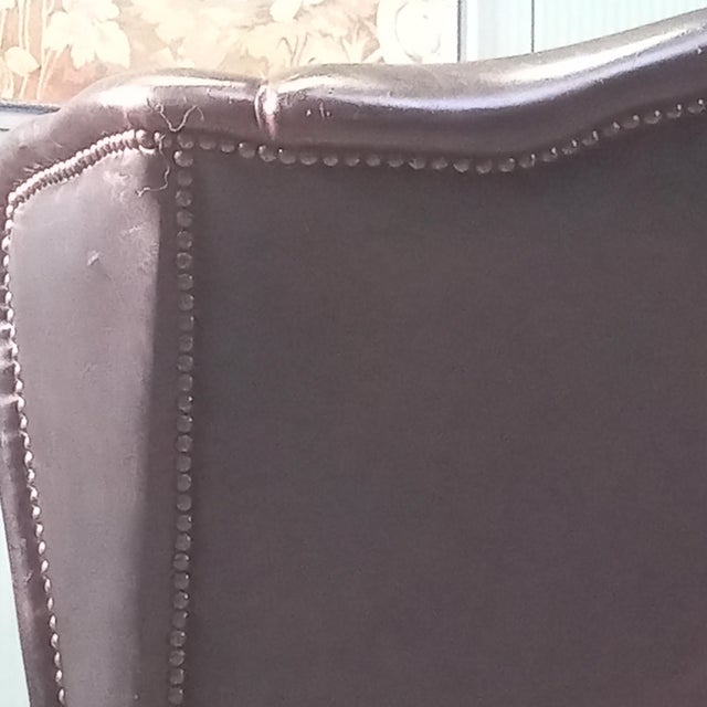 Black Leather Wing Armchair – Classic English Style This black leather wing armchair in classic English style combines...