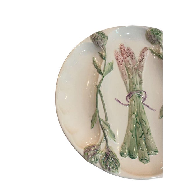 Beautiful French asparagus majolica plate. These were popular in the 19th and 20th century for serving the prized spring...