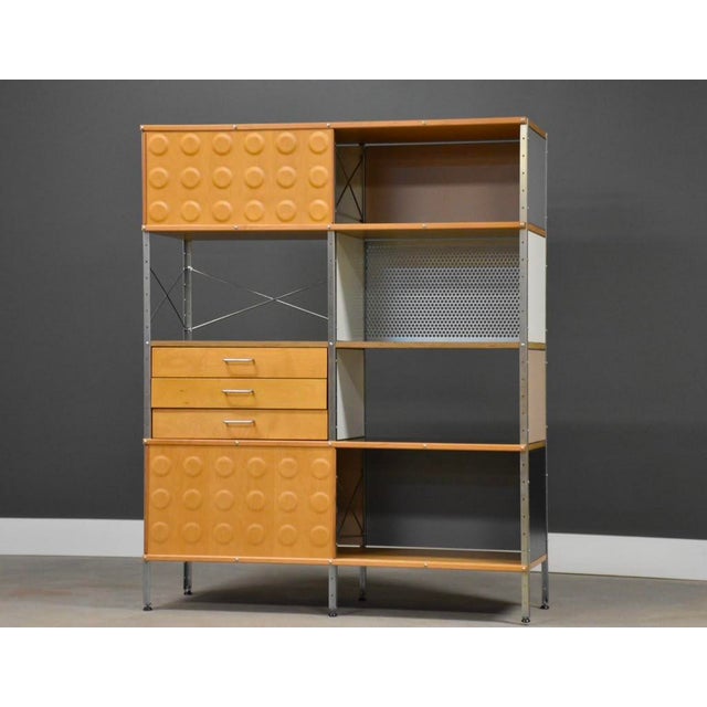 A mid century modern designed maple sideboard credenza wall unit storage designed by Charles and Ray Eames for Herman...