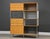A mid century modern designed maple sideboard credenza wall unit storage designed by Charles and Ray Eames for Herman...