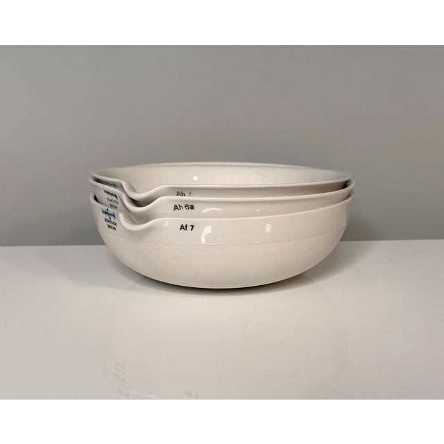 This set of original 'lab' porcelain bowls was manufactured by kpm berlin (staatlich berlin), dating from the interwar...