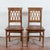 This pair of vintage solid wood chairs strikes a perfect balance between structural solidity and geometric elegance,...