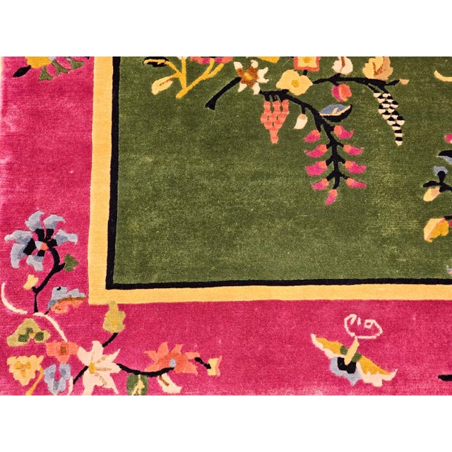 3’ 10” x 5’ 6” Beautiful vintage Art Deco Chinese area rug in an allover floral pattern in sage green field and a royal...