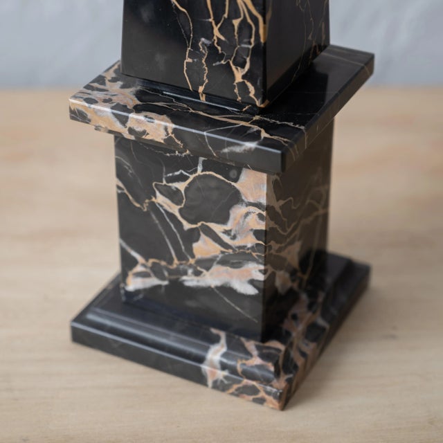 A black portoro Italian marble obelisk, 20th century. 4 ¼ inches wide by 19 ¾ inches tall