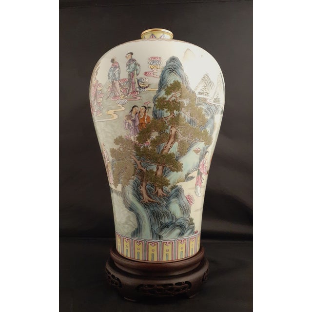 Chinese porcelain Baxian meiping, a plum shape vase with a white glazed interior, polychrome glazed exterior, a gilt lip,...
