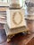 This stunning pair of tole lamps has cream bases with gold detailing throughout. The lamps feel substantial and sturdy....