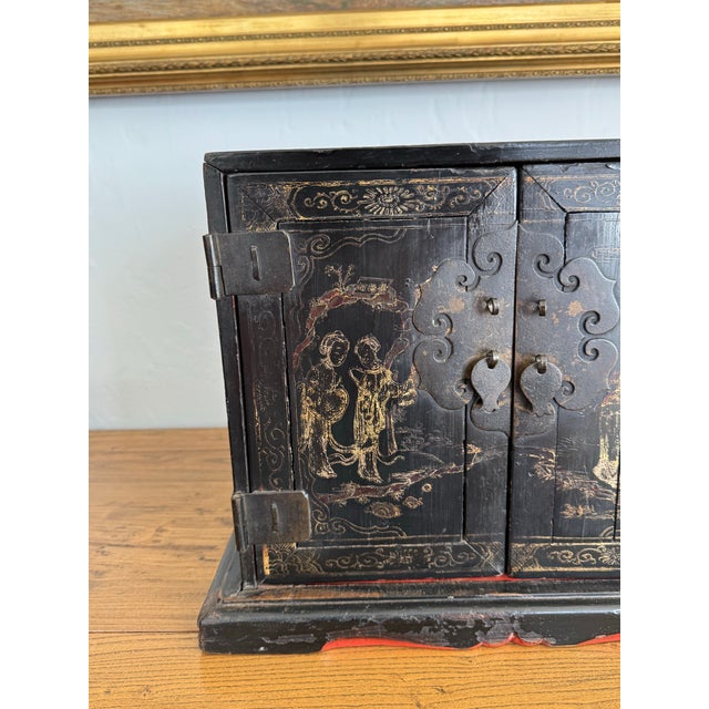Paint Antique Chinese Black Lacquer Jewelry Cabinet Gold Gilt Figural Chest For Sale - Image 7 of 11