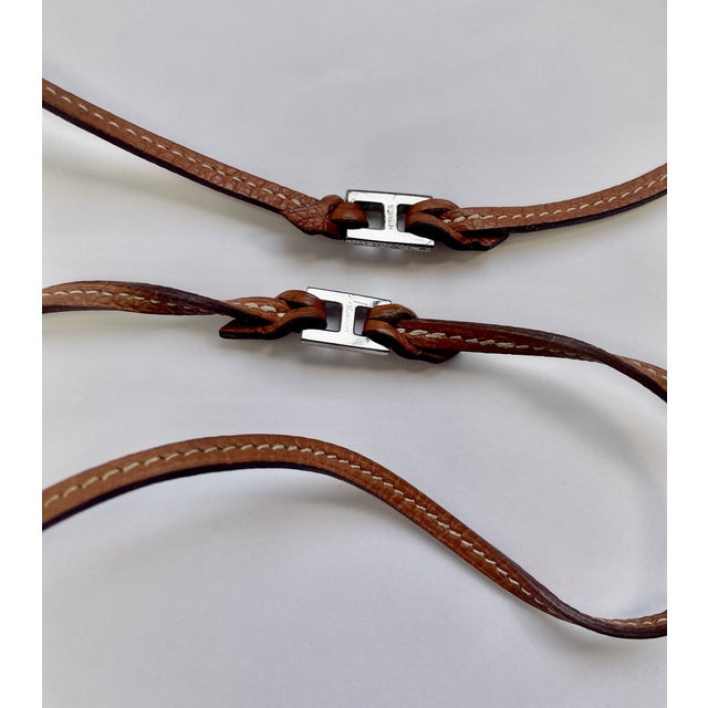 Bought in the late 1990s from the New York Flagship shop on Madison Avenue, these are caramel-colored leather with white...
