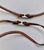 Bought in the late 1990s from the New York Flagship shop on Madison Avenue, these are caramel-colored leather with white...