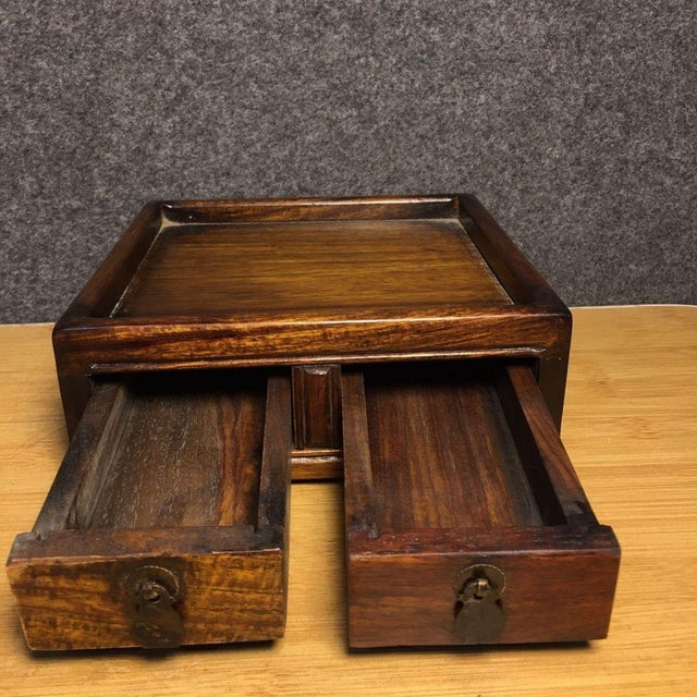 This elegant vintage wooden desk organizer combines functionality with beautiful craftsmanship. Made from a richly grained...