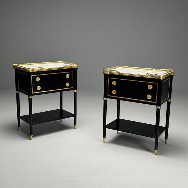 Maison Jansen Style, Louis XVI Style, Hollywood Regency, Brass, Marble, Ebonized Nightstands This pair of ebony painted...