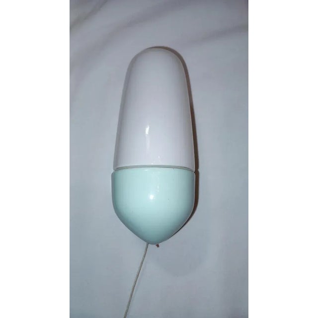 Wilhelm Wagenfeld wall lamp with 1x E14 socket from the 1950s. The lamp is in its original condition and the electrical...