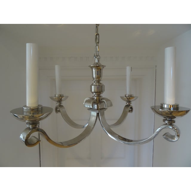 A beautiful polished nickel 4 light chandelier Model MS5025PN by renowned designer Michael Smith With an original retail...