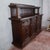 This imposing late 19th-century sideboard with a plate rack expresses the monumental taste and majesty of the Italian Neo-...