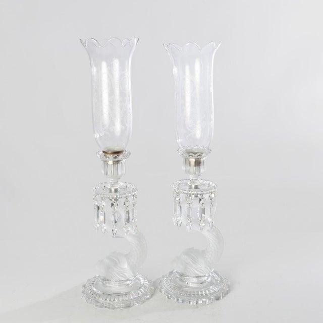 Wonderful pair of Baccarat dolphin candlesticks. Demonstrates the elegance and sophistication of the French design.