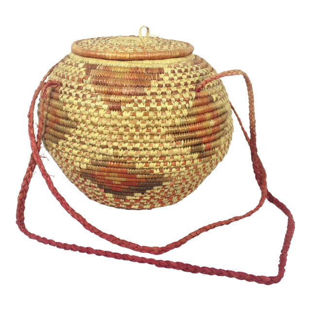 Vintage African Coiled Straw Lidded Two Tone Orange Hand Woven Covered Basket With Straps For Sale