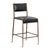 Antiqued bronze finish hammered iron frame counter stool with black leather upholstered seat and back.