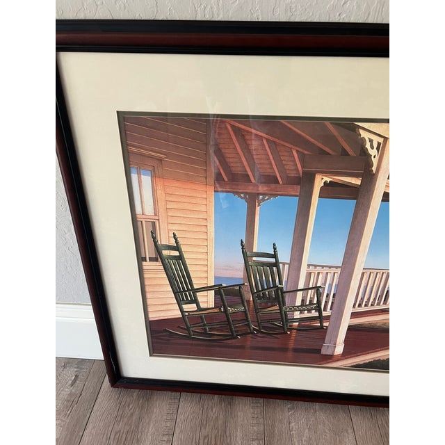 Offered here is a framed coastal print by Daniel Pollera, likely dating to the c. 1990s-2000s. The print has the printed...