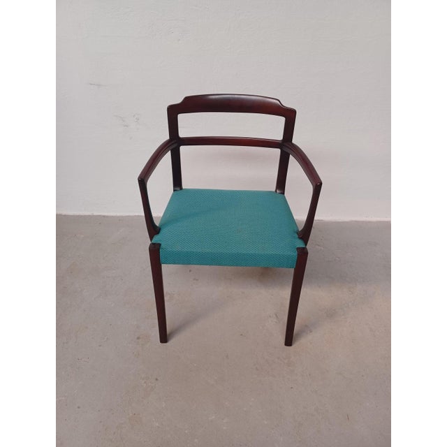 Set of two fully restored Danish Ole Wanscher mahogany arm chairs custom reupholstery T he chairs feature a well well...