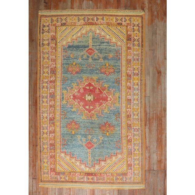 An intermediate size Vintage Moroccan rug from the 3rd quarter of the 20th century Measures: 4'5'' x 6'1''.